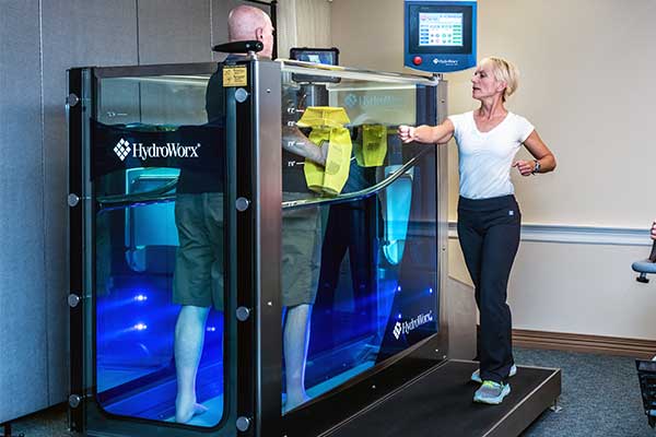 Person Using HydroWorx 300 with Trainer